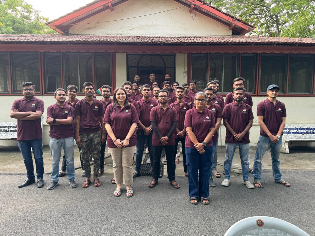 The Flame Solren crew in matching maroon t-shirts